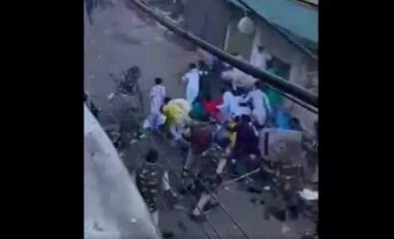 False: The image from a video shows Uttar Pradesh police beating people offering prayers on the street.