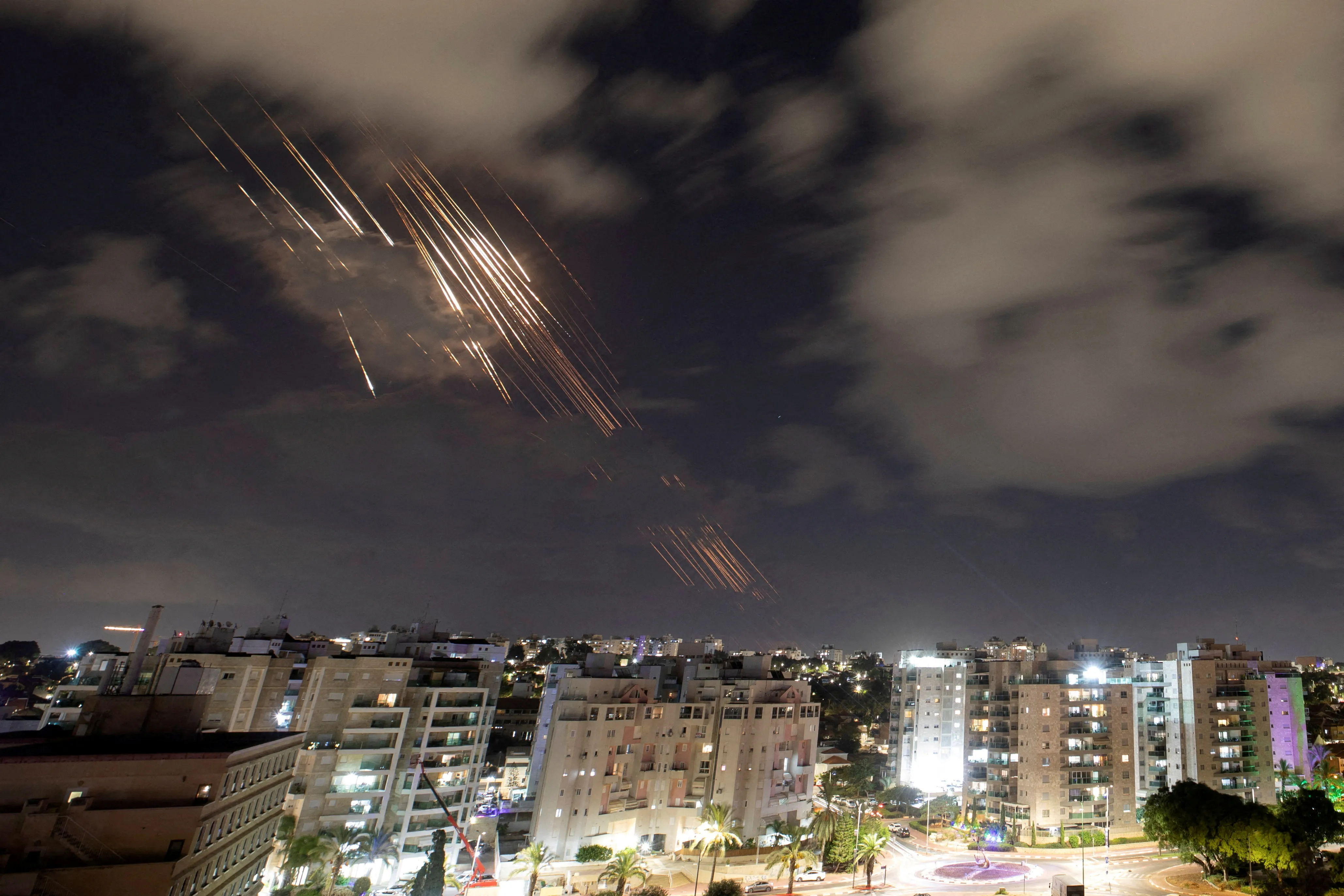 Israel's Iron Dome anti-missile system intercepts rockets after Iran fired a salvo of ballistic missiles, as seen from Ashkelon, Israel.