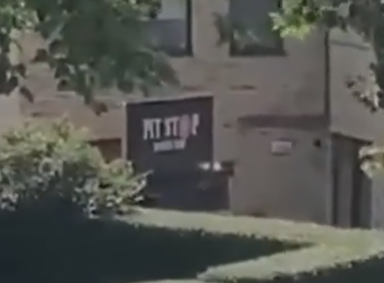 Street sign shown in the video.