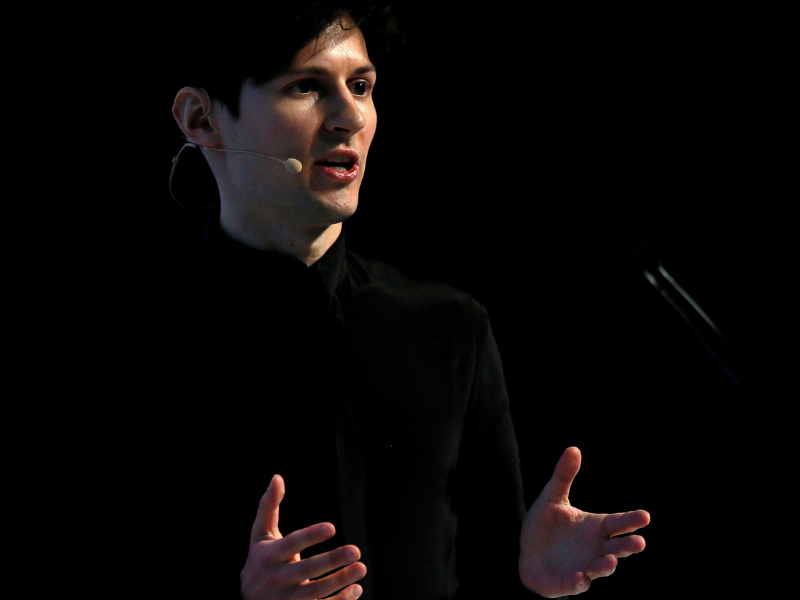 The image shows Telegram founder and CEO Pavel Durov speaking at the Mobile World Congress in Barcelona in February 2024.