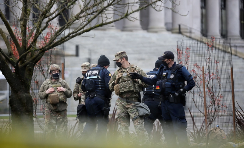 True: National Guard troops were asked to sleep in a parking garage.