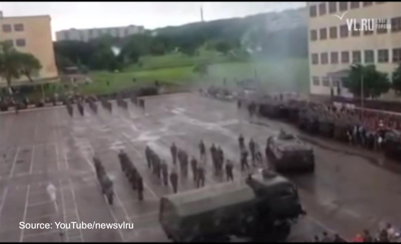 False: A Russian military vehicle runs over a Russian soldier during a procession amid the ongoing war.