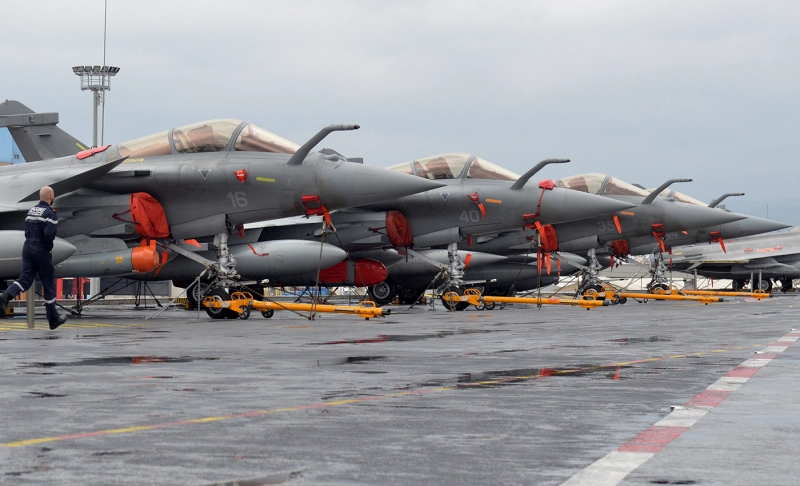 False: France bode farewell to Rafales jets destined for India, forming the Tricolour in the skies.