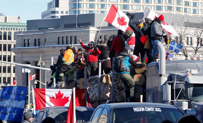 False: Ontario Provincial Police has reported over 100,000 trucks and the Royal Canadian Mounted Police has reported over 130,000 trucks in the "Freedom Convoy 2022" in Ottawa.