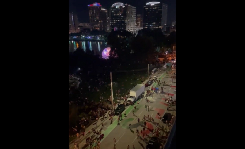 False: A video shows people running in fear after hearing gunshots at Lake Eola, Orlando.