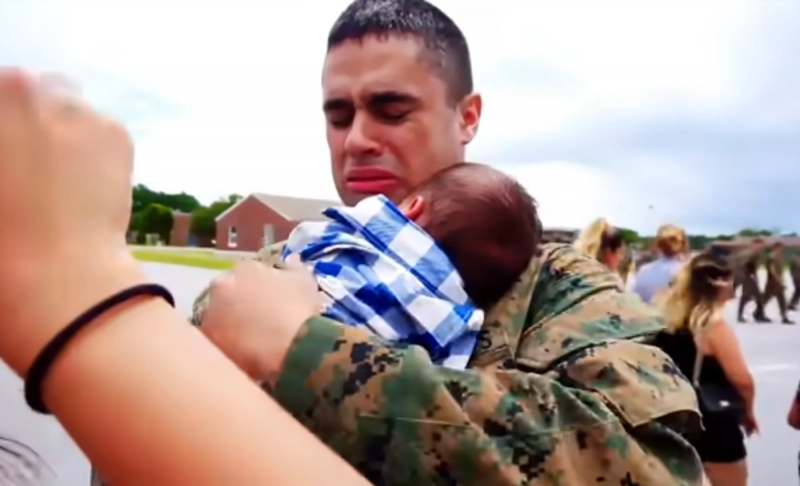 False: This image from a video shows a Ukrainian soldier bidding farewell to his family.